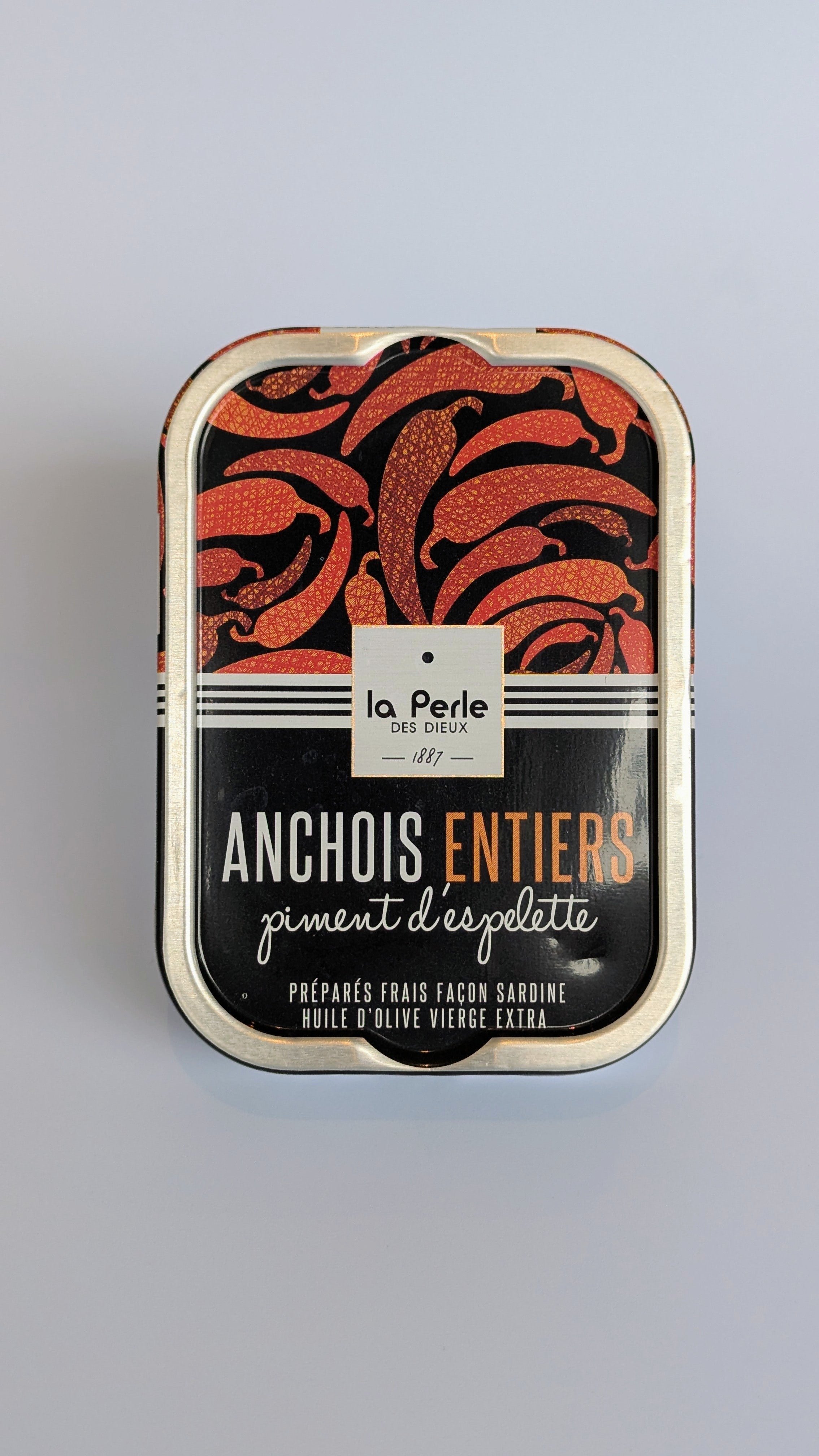 Hele ansjovis in olijfolie met Espelette peper